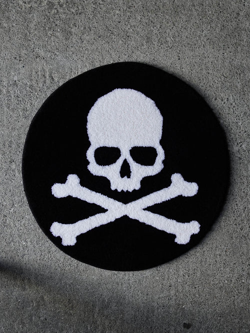 The Skull and Crossbones Circle Rug. A clean, classic underground tattoo design tufted in heavy black and white.